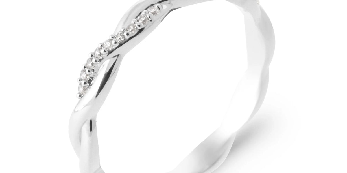 Bague alliance torsadée et brin serti de zircons en argent 925, vue de face