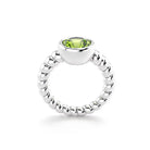 Bague indiscrète pour femme en argent et péridot