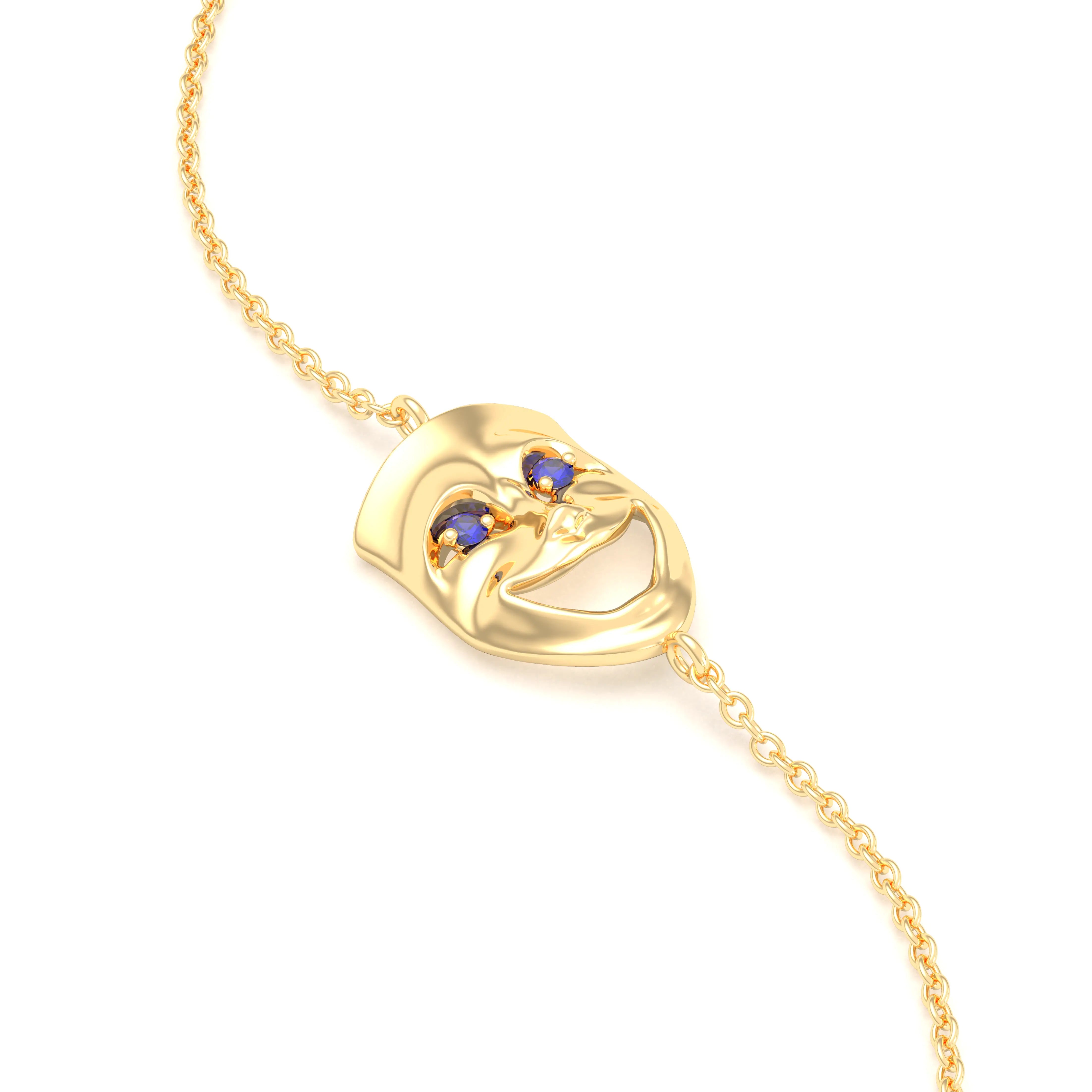Bracelet Allégresse en or jaune 18 carats, masque souriant du théâtre Saphir bleu