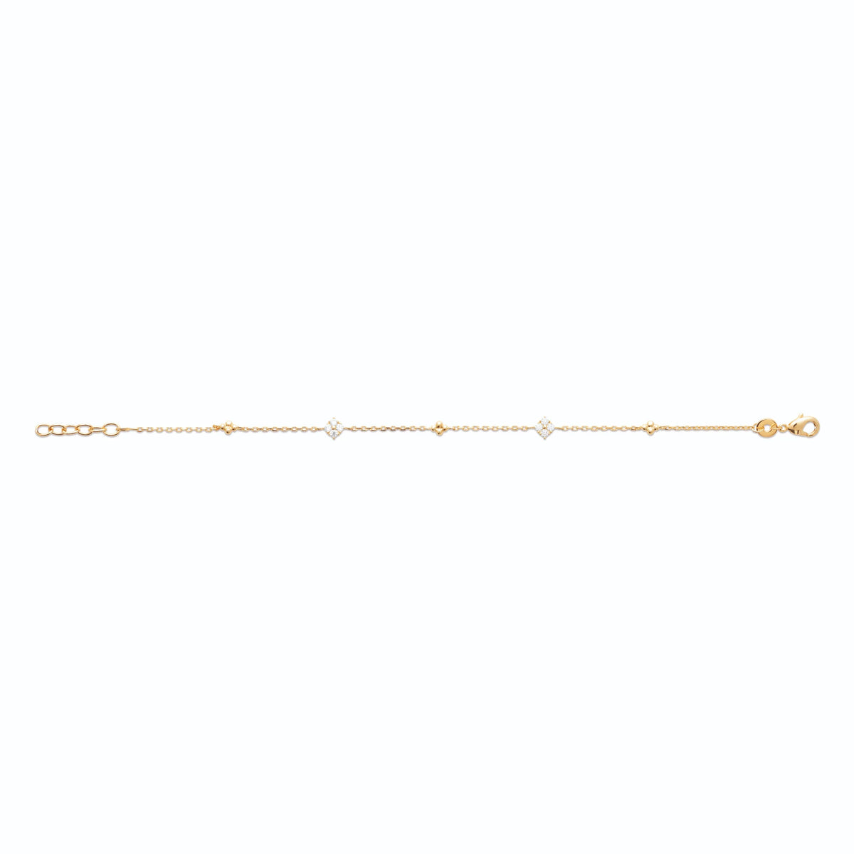Bracelet chaîne à stations de zircons en plaqué or