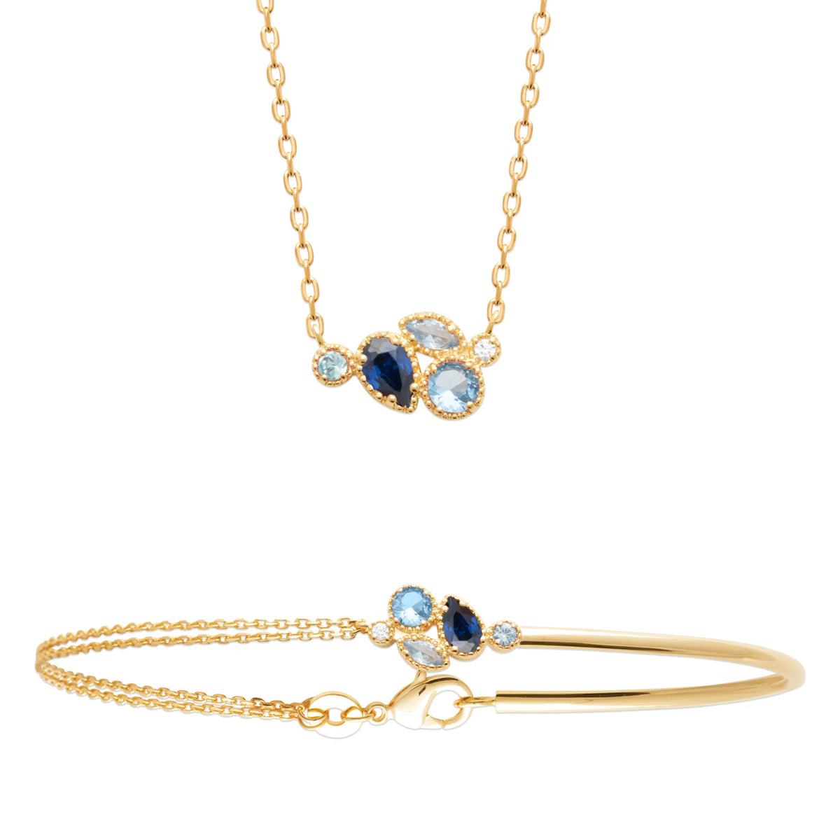 Bracelet demi-jonc grappe de pierres bleues et zircons en plaqué or