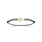 bracelet plaqué or motif serpent et cordon noir