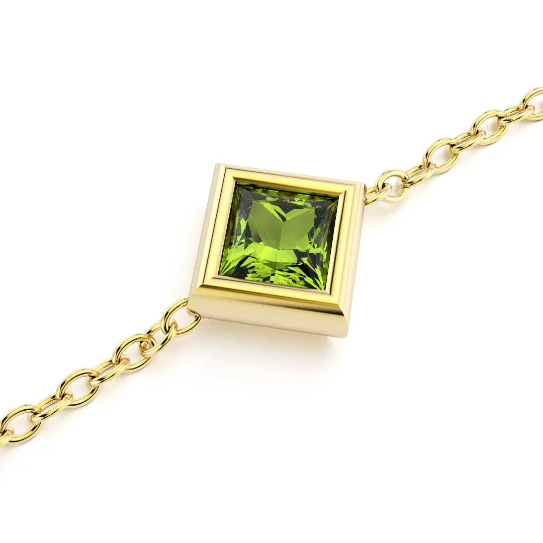 bracelet byzance pour femme forme carré en or jaune avec peridot
