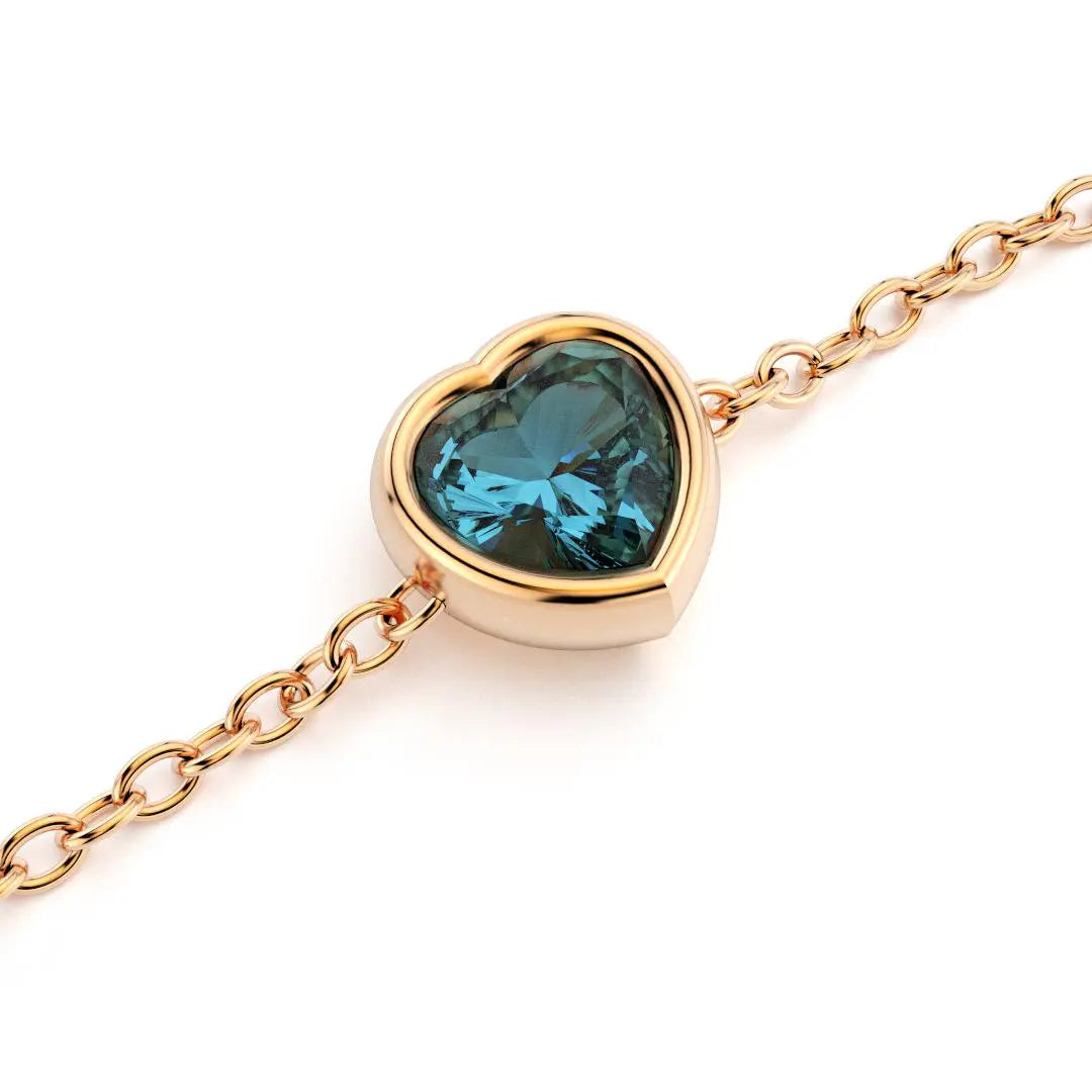 bracelet byzance pour femme forme coeur en or rose avec topaze