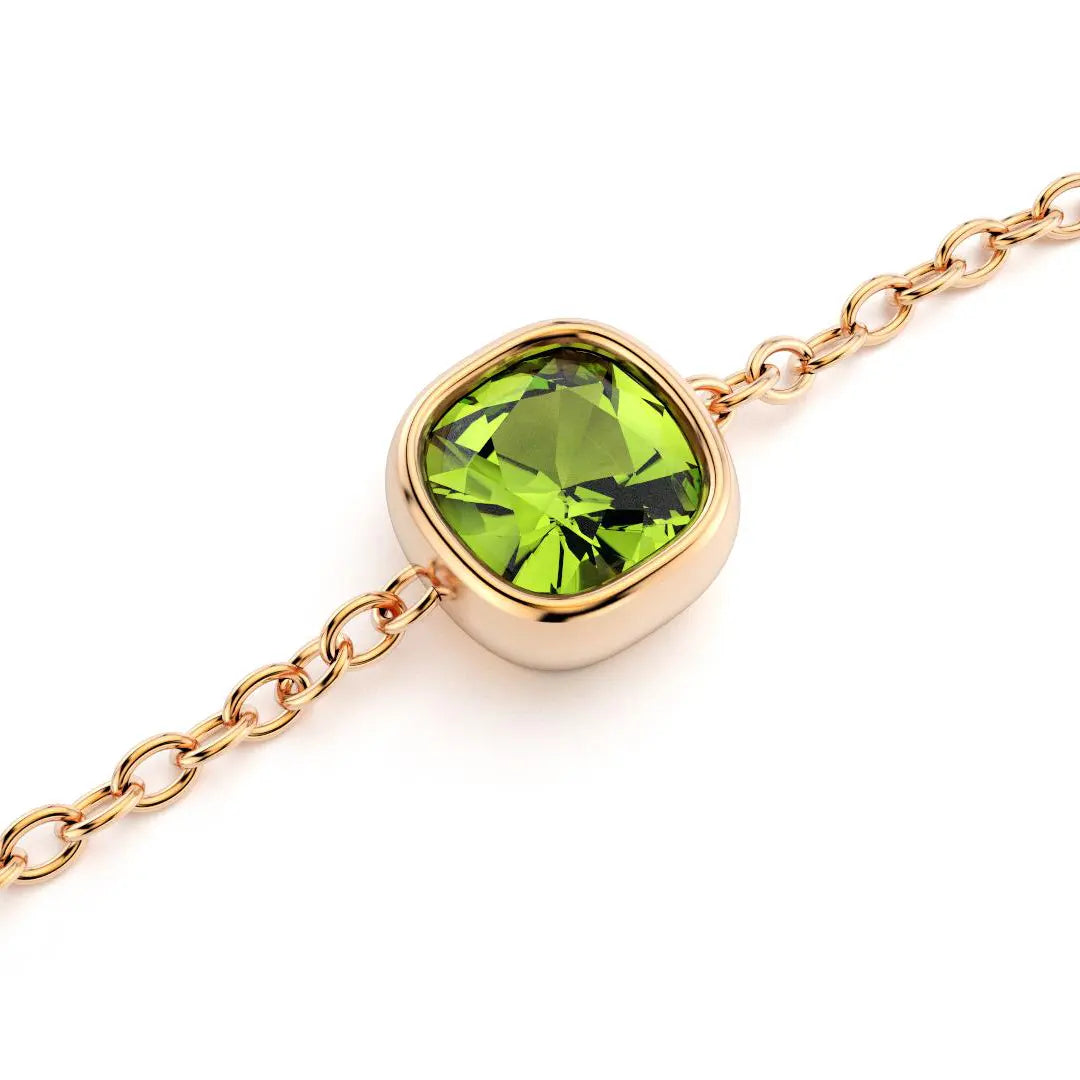 bracelet byzance pour femme forme coussin en or rose avec peridot