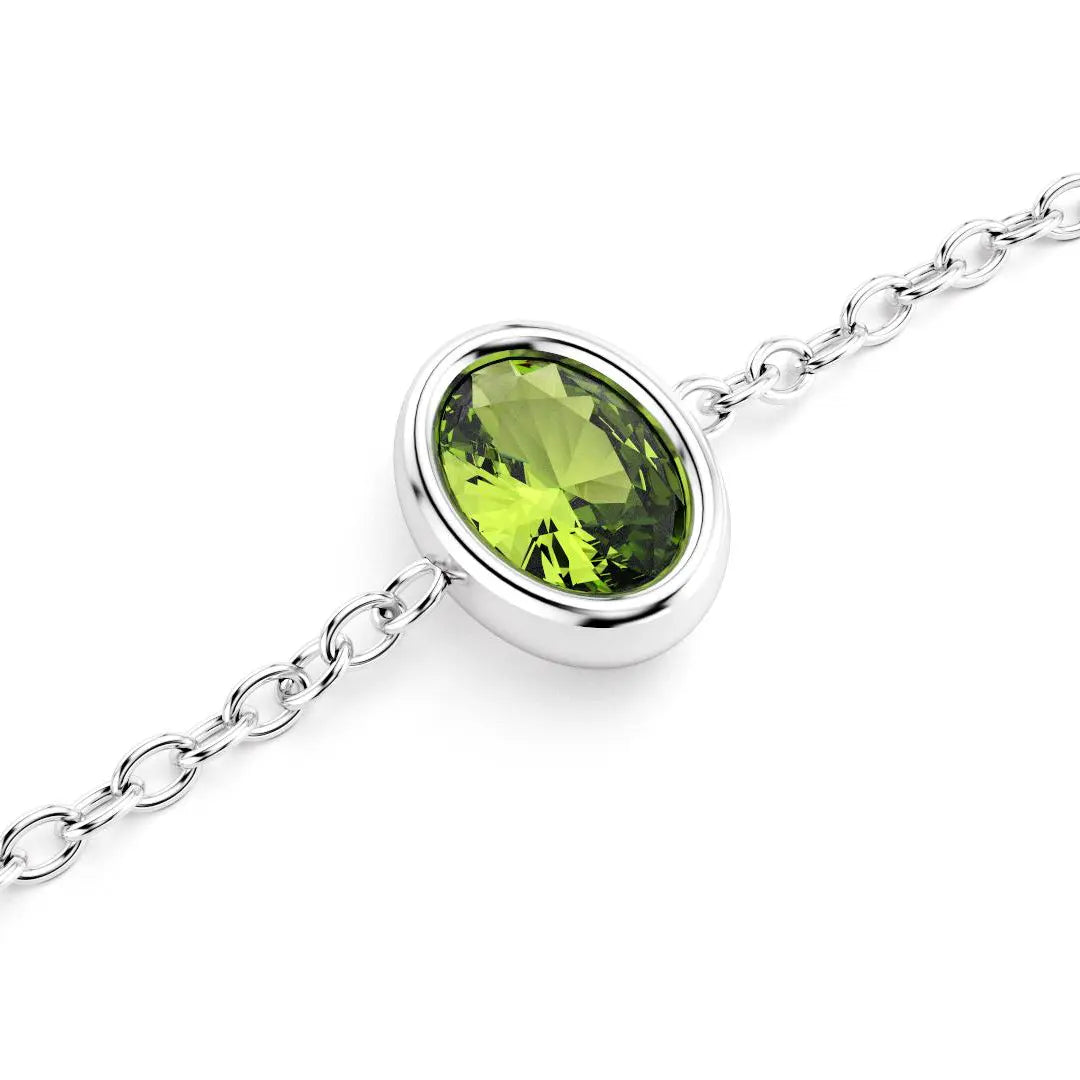 bracelet byzance pour femme forme ovale en or blanc et peridot