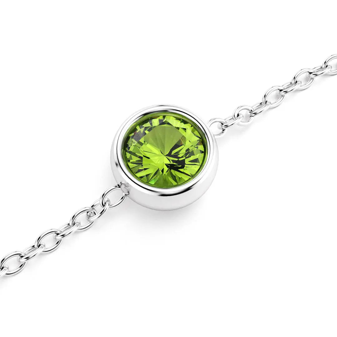 bracelet byzance pour femme forme ronde en or blanc avec peridot