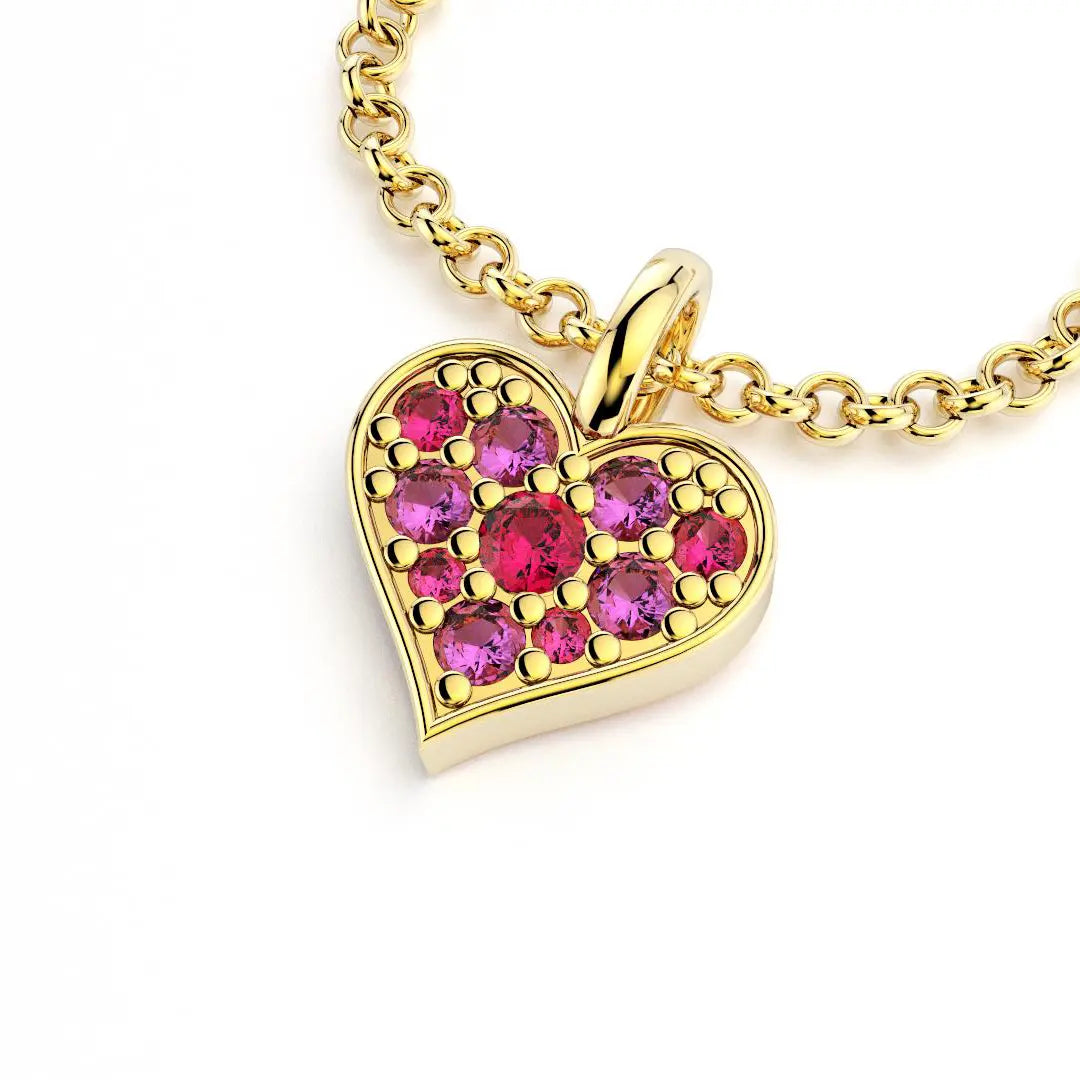 Collier coeur en or jaune avec saphirs magenta et rubis