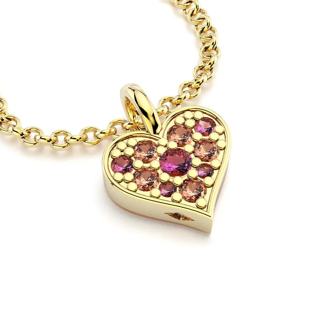 Collier coeur en or jaune avec saphirs pêches et saphirs roses