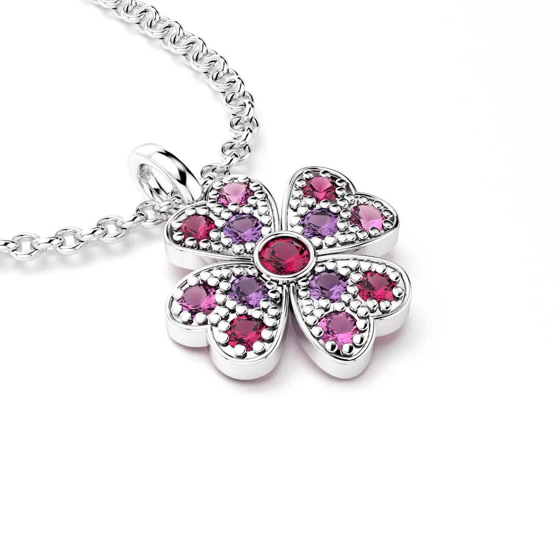 collier trefle  pour femme en or blanc et rubis et saphirs roses et saphirs violets