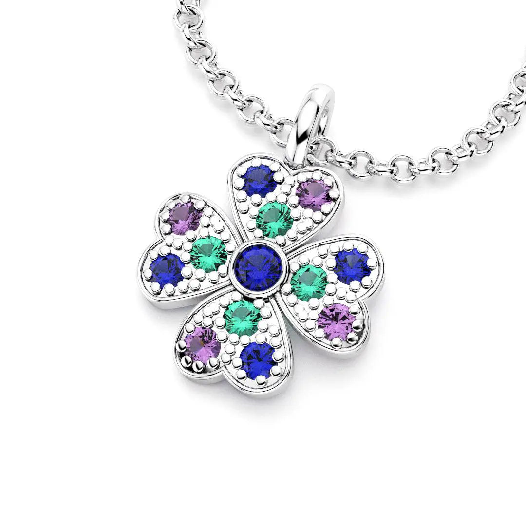 collier trefle  pour femme en or blanc et saphirs bleus et saphirs violets et emeraude