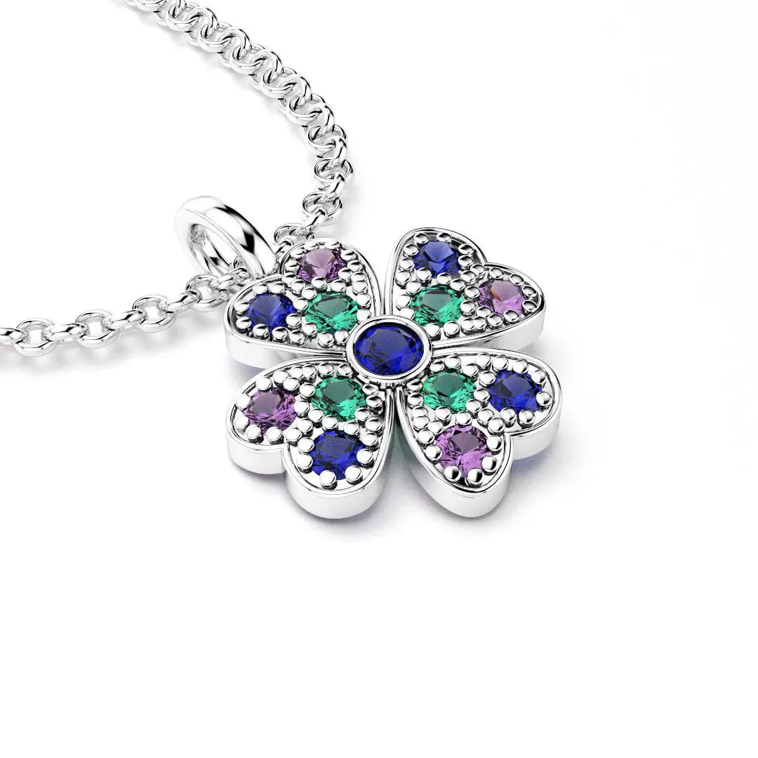 collier trefle  pour femme en or blanc et saphirs bleus et saphirs violets et emeraude