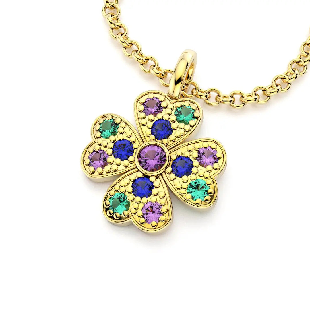collier trefle  pour femme en or jaune et saphirs bleu et saphirs violets et emeraudes