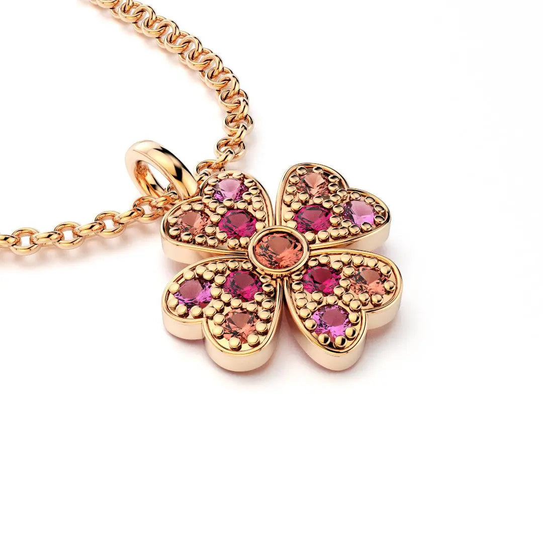 collier trefle  pour femme en or rose et rubis et saphirs peches et saphirs rose