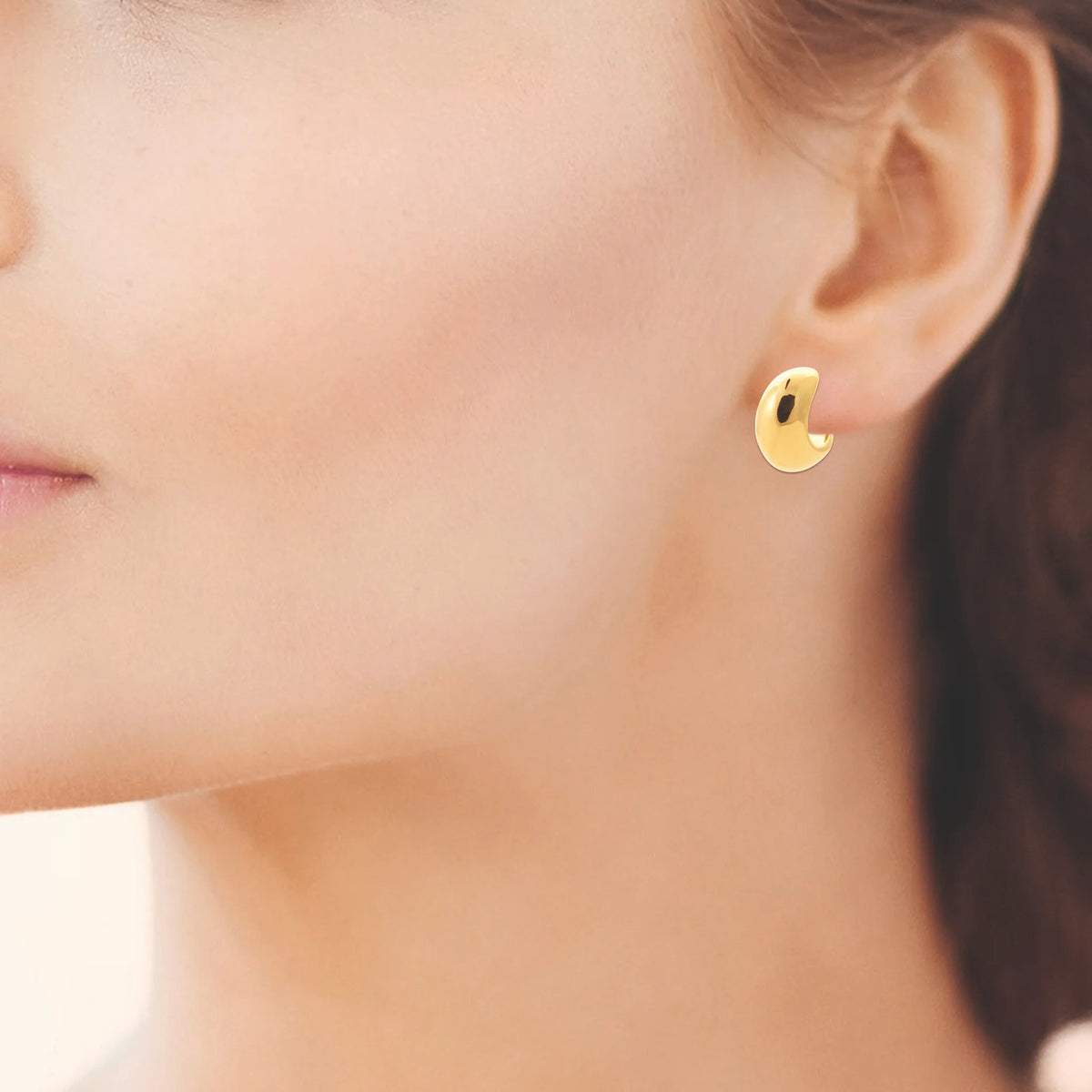 Boucles d’oreilles demi-créoles croissant en acier PVD doré