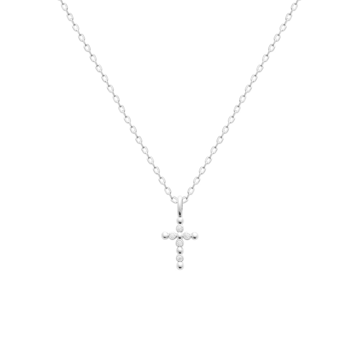Pendentif croix à boules serties de zircons en argent rhodié vu de profil