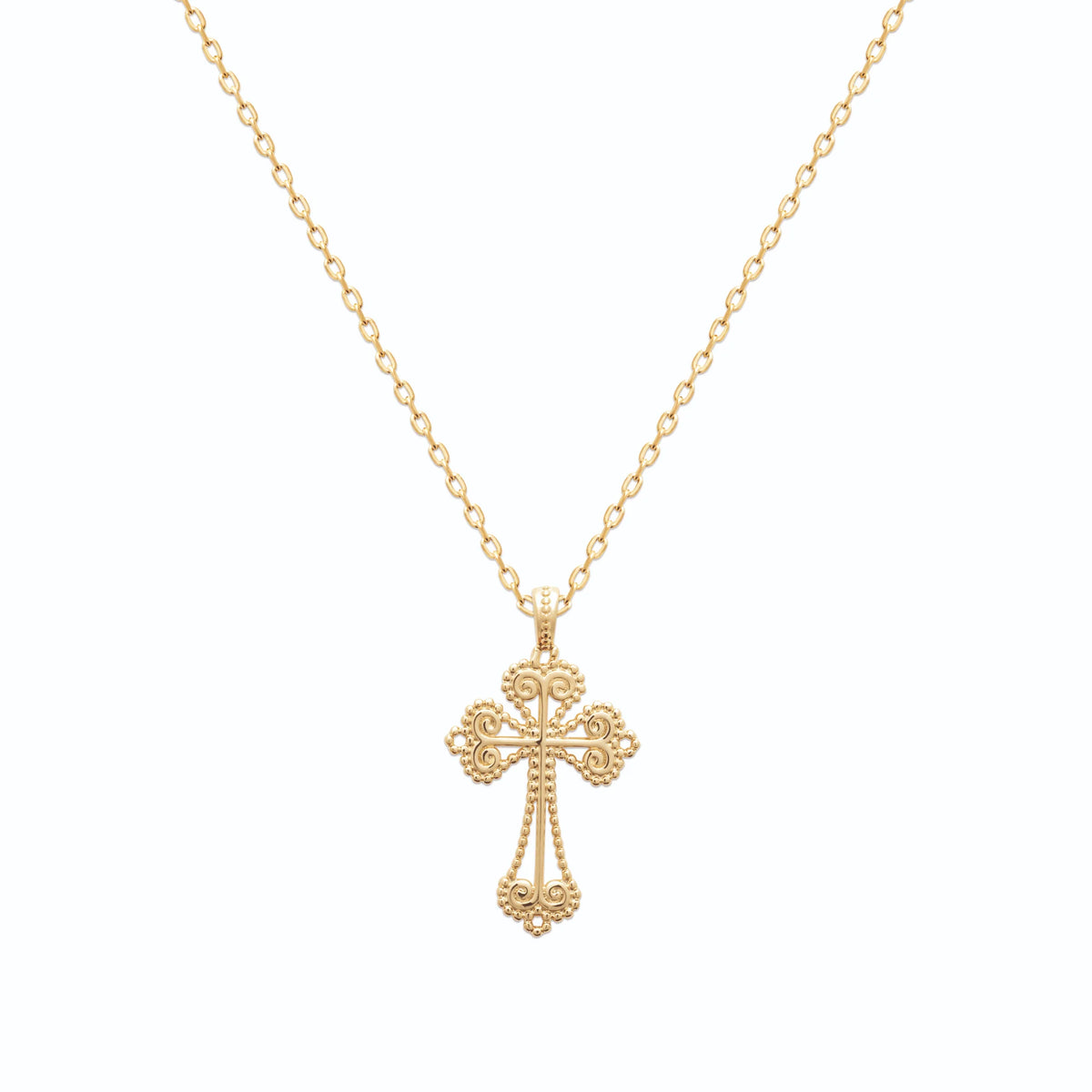 Pendentif croix filigranée en plaqué or vu de profil