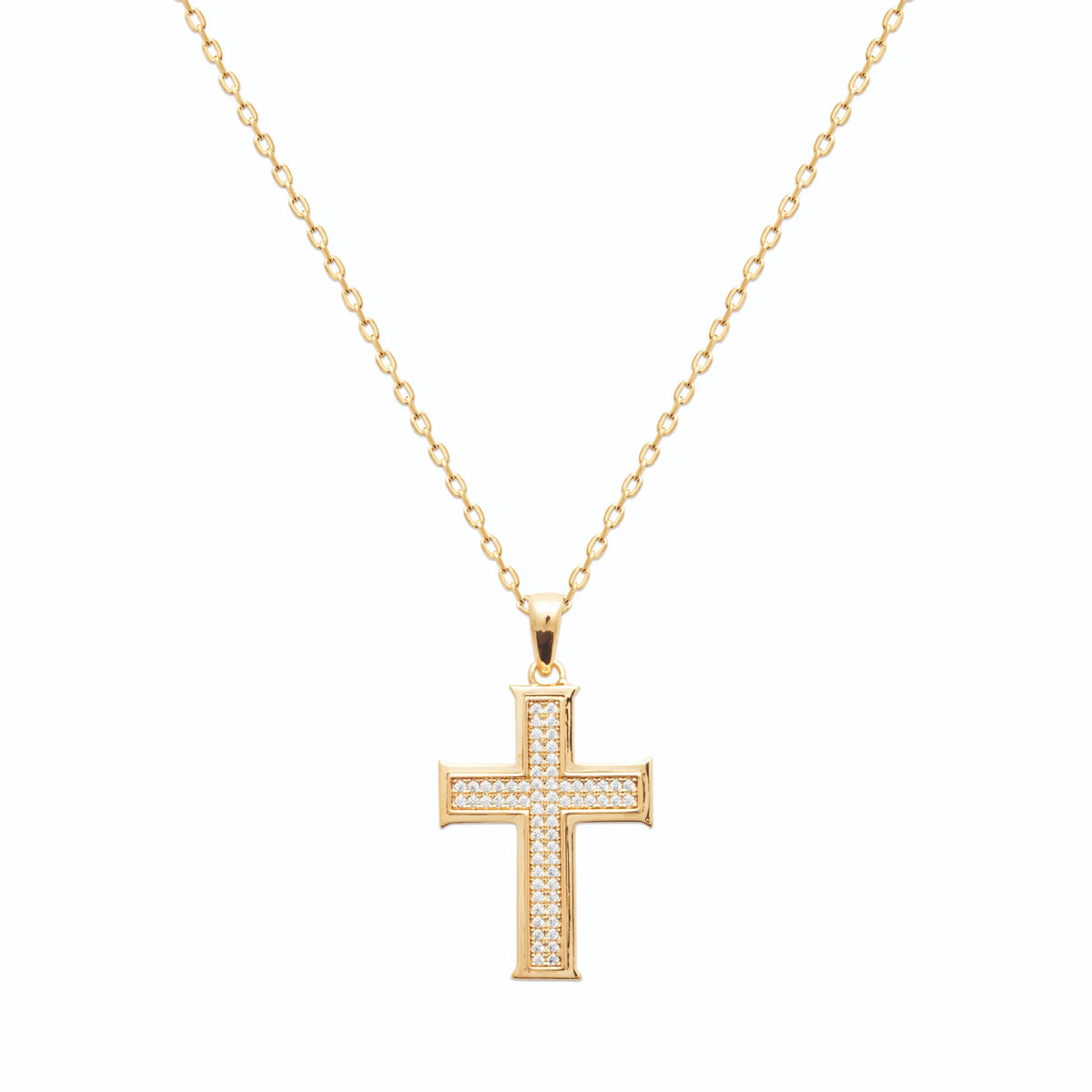 Pendentif croix pavée de zircons en plaqué or vu de profil