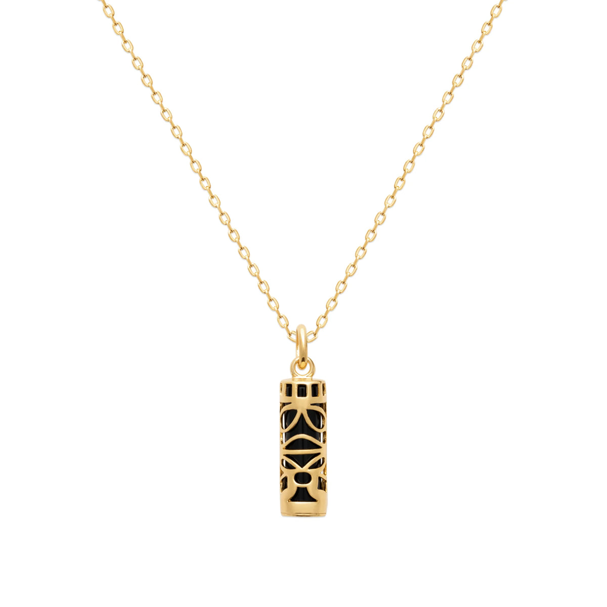 Pendentif tiki ajouré sur pierre noire en plaqué or vu de profil