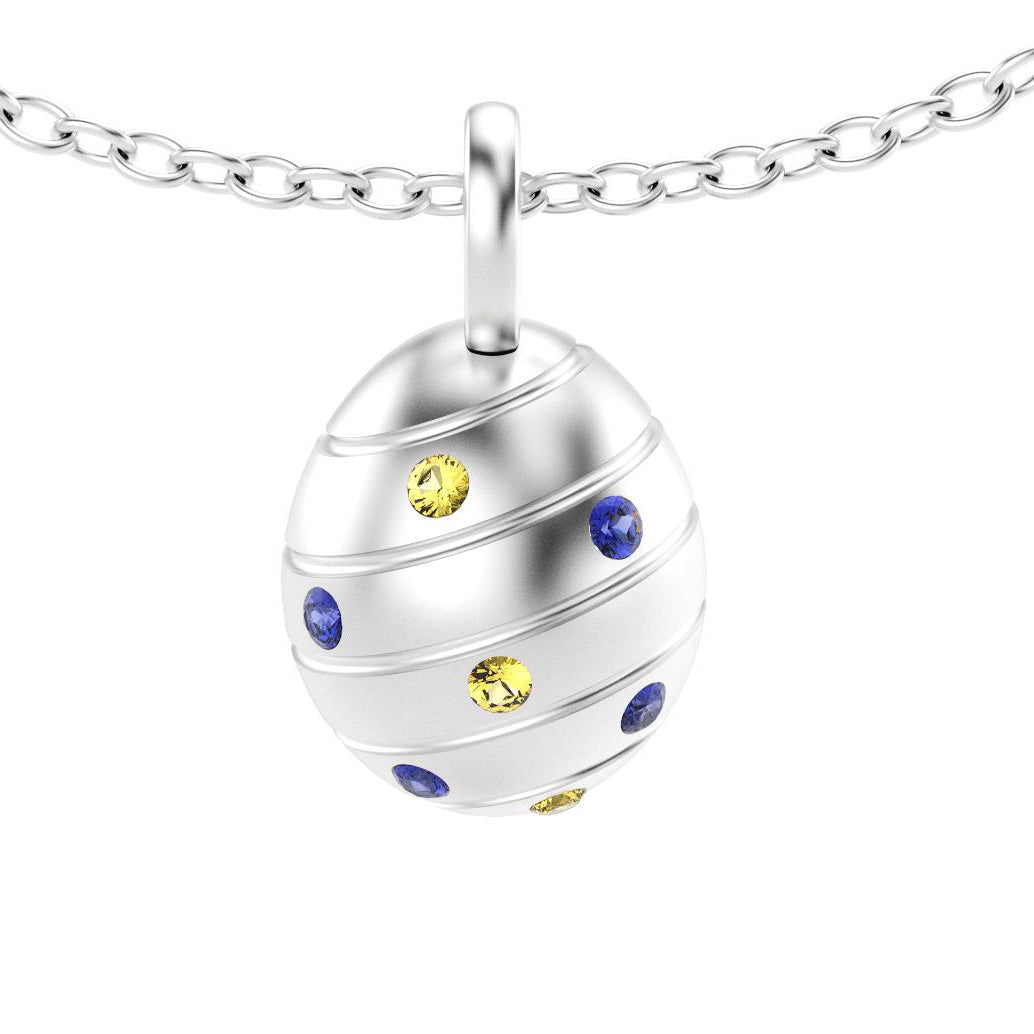 pendentif oeuf pour femme en argent avec saphirs bleus et saphirs jaune