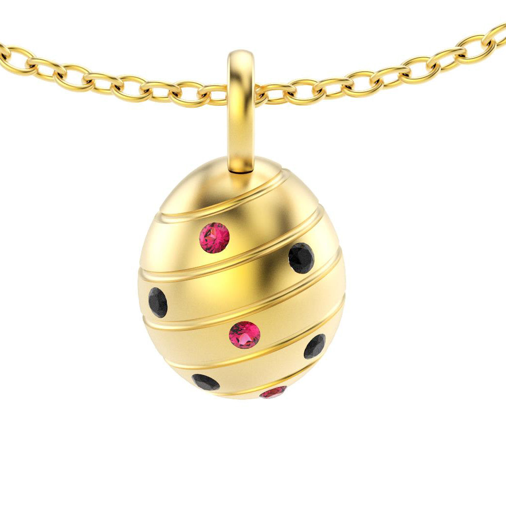 pendentif oeuf pour femme en or jaune avec spinelles noires et rubis