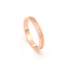 Alliance Unisson double rang à texture centrale en or rose 18 carats