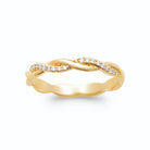 Bague alliance fine torsadée dont un brin serti de zircons en plaqué or