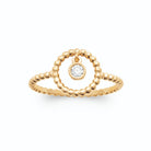 Bague anneau perlé cercle ouvert et zircon suspendu plaqué or, vue de face