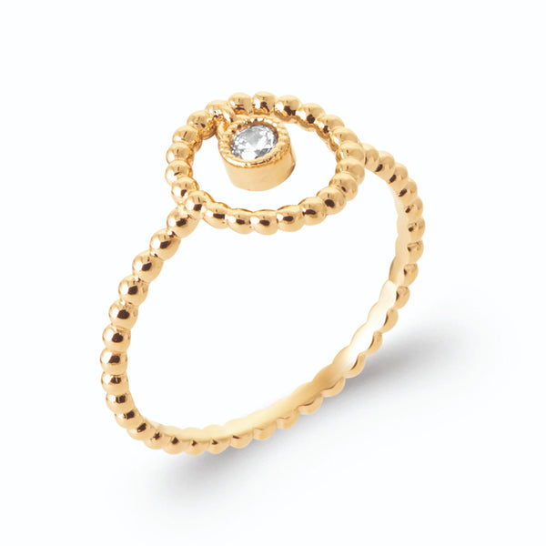 Bague anneau perlé cercle ouvert et zircon suspendu en plaqué or, vue de trois quarts