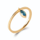 Bague anneau perlé et pampille pierre navette bleu ciel en plaqué or