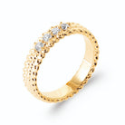 Bague anneau perlé quatre zircons alignés en plaqué or