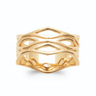 Bague bandeau large ajouré de fils ondulés entrecroisés plaqué or, vue de face
