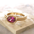 bague byzance pour femme en or rose avec grenat rhodolite rond