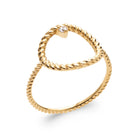 Bague cercle ouvert en fil torsadé et zircon sur anneau torsadé en plaqué or