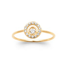 Bague plaqué or, zircon central entouré d’un cercle d’or et d’une couronne de zircons