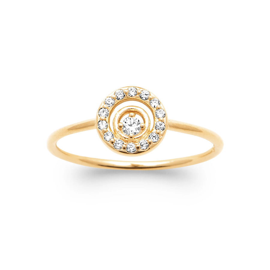 Bague cible zircons en plaqué or, portée à la main