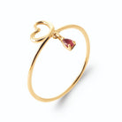 Bague contour de cœur noué et pampille rouge cerise en plaqué or