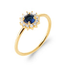 Bague corolle de zircons et pierre ovale bleu nuit en plaqué or
