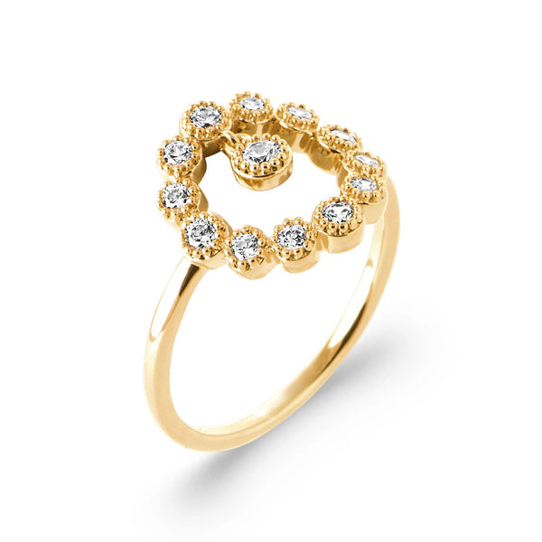 Bague couronne de zircons et pampille en plaqué or, vue de trois quarts