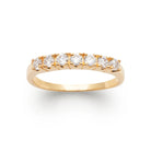 Bague demi-alliance zircons sertis griffes en plaqué or