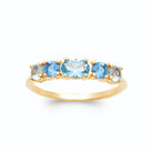 Bague demi-rivière de cinq pierres en camaïeu de bleus plaqué or, vue de face