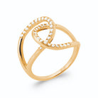 Bague deux anneaux enlacés en boucle pavée de zircons en plaqué or