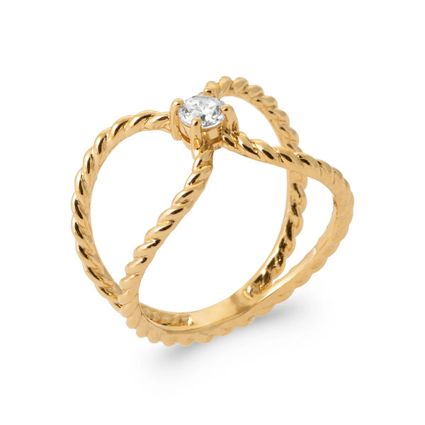 Bague deux anneaux torsadés croisés et zircon au croisement en plaqué or, vue de trois quarts