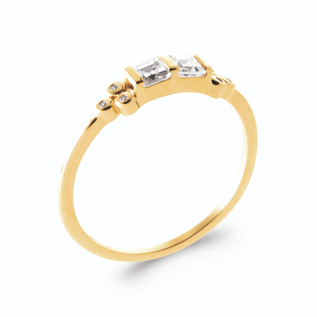 Bague deux zircons carrés serti clos et grains d’or en plaqué or