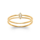 Bague double anneau fil barrette de trois zircons plaqué or, vue de face