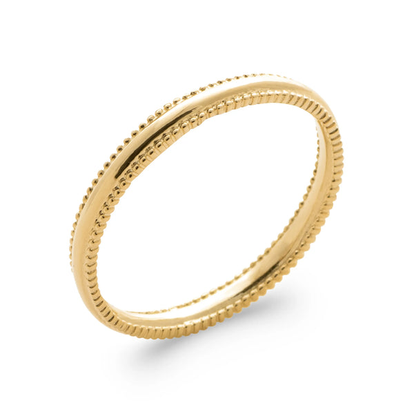 Bague double anneau fin perlé de grains d’or en plaqué or, vue de trois quarts