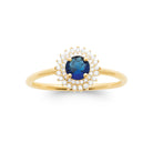 Bague double entourage de zircons et pierre ronde bleu nuit en plaqué or