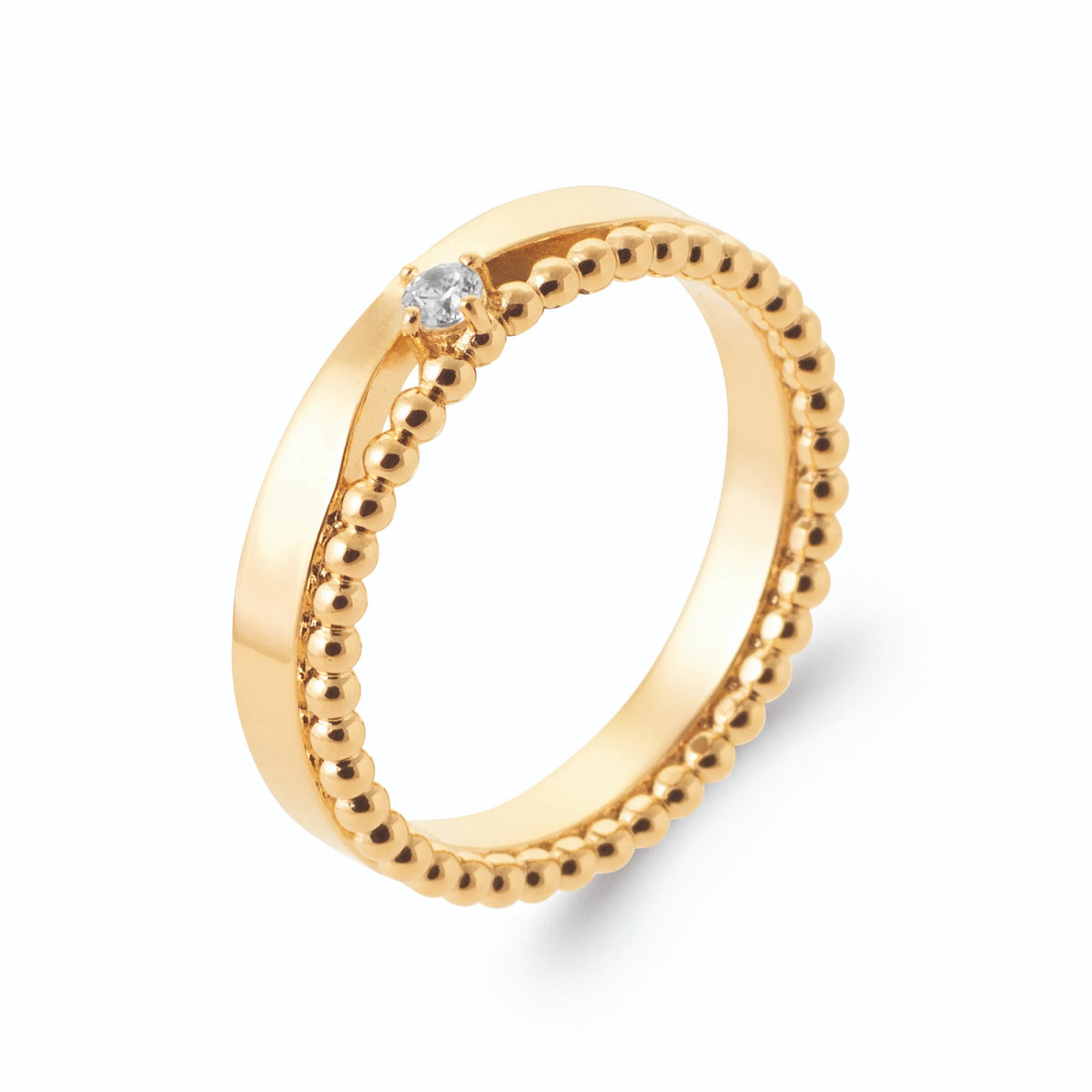 Bague duo anneau lisse et anneau perlé avec petit zircon en plaqué or, vue de trois quarts
