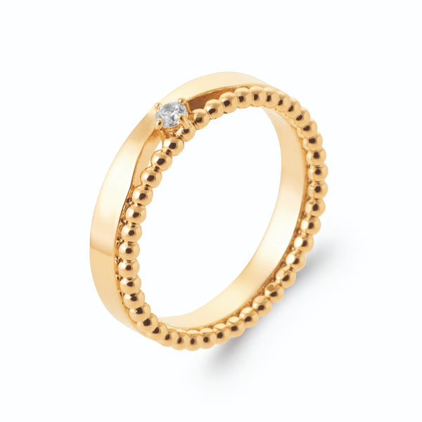 Bague duo anneau lisse et anneau perlé avec petit zircon en plaqué or, vue de trois quarts