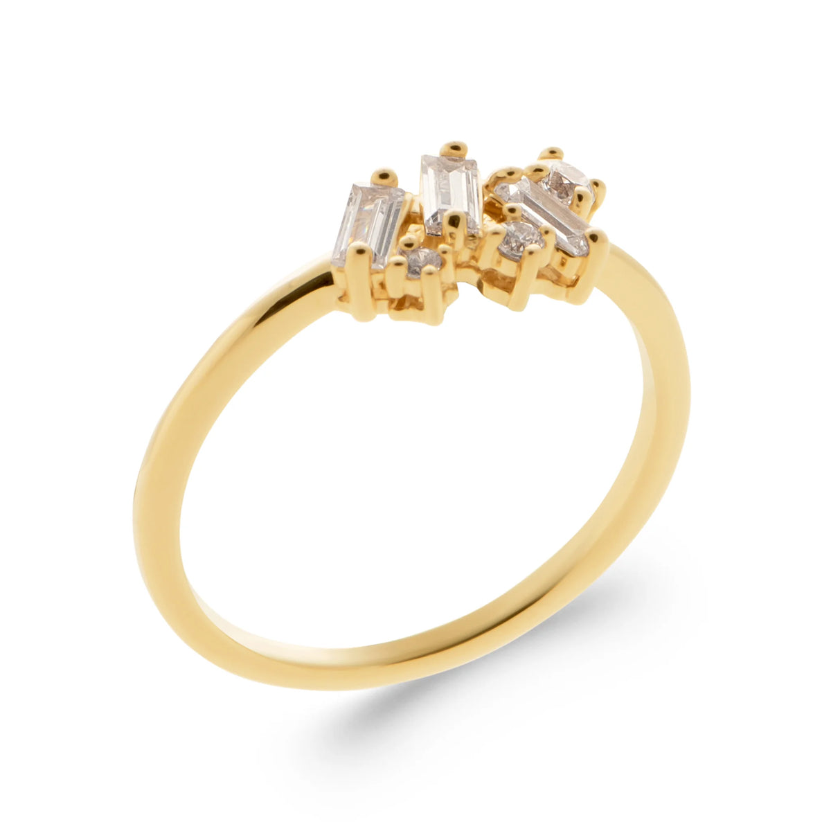 Bague éclat asymétrique de zircons baguettes et ronds en plaqué or